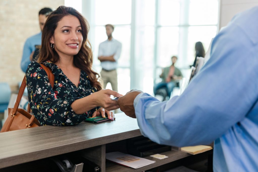 A customer standing in line at the bank